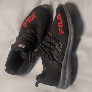 Fila slip on athletic shoes.